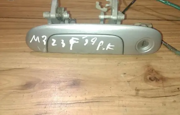 Mazda 323 F Front door exterior handle
