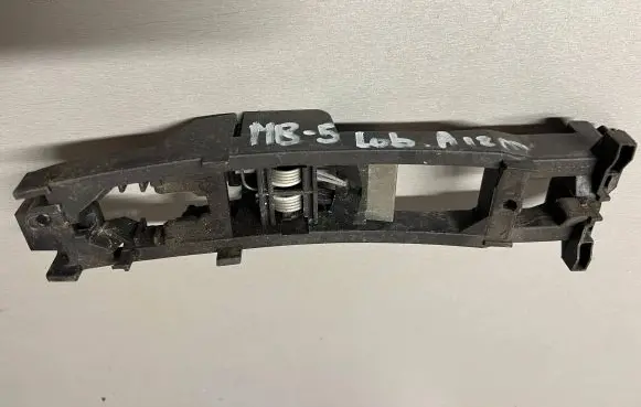 Rear door exterior handle/bracket