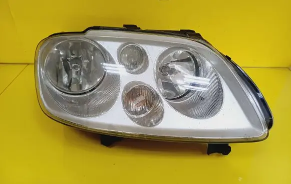 Volkswagen Touran I Headlight/headlamp 0301205202 1T0941006D