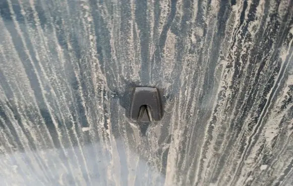 Windshield washer spray nozzle