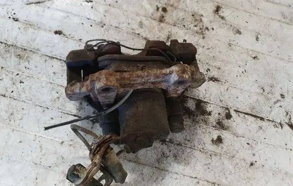 Volkswagen PASSAT B5 Front brake caliper NOCODE