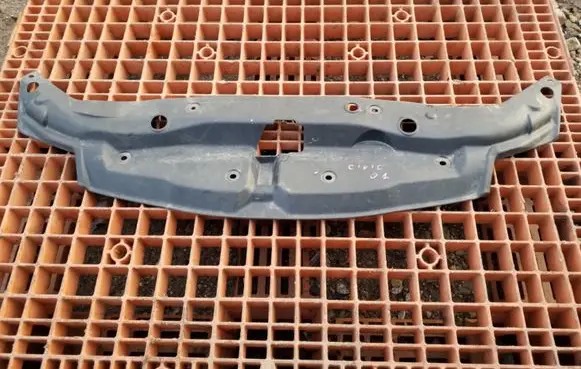Engine bonnet/hood lock trim molding