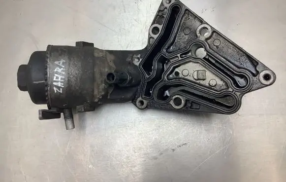 Opel Zafira B Oil filter mounting bracket 55199627