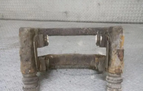 Opel Astra H Brake caliper pad carrier rear 