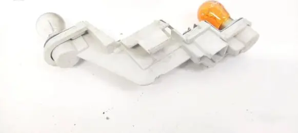 Tail light bulb cover holder