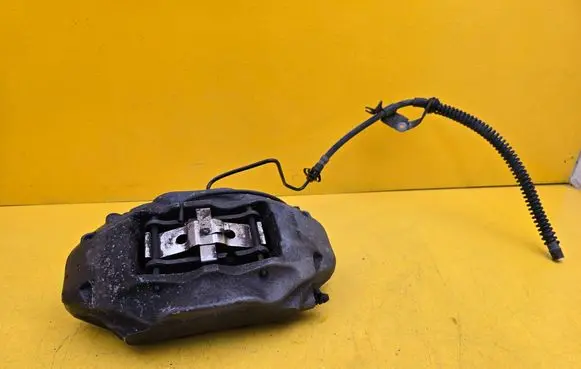 Volkswagen Touareg II Front brake caliper 7P6615106AE