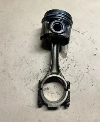 Piston with connecting rod