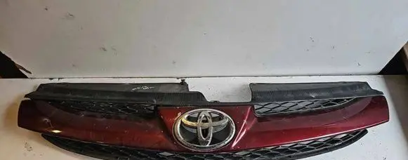 Toyota Sienna XL20 II Front bumper upper radiator grill 53101AB050