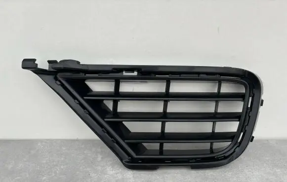 Volkswagen Touareg II Front bumper lower grill 7P6853LH