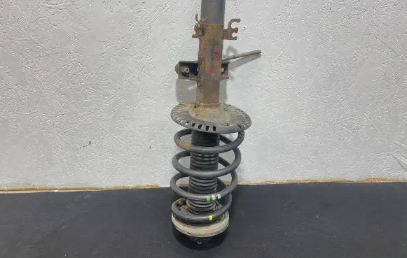 Volkswagen Transporter - Caravelle T5 Front shock absorber with coil spring 7H0412137