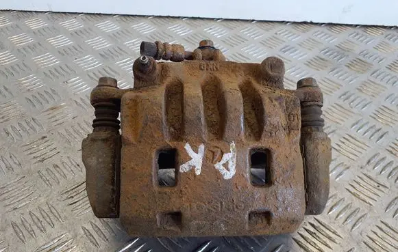 Subaru Impreza III Front brake caliper