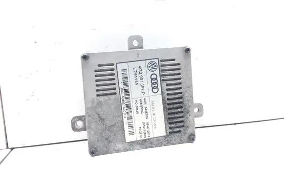 Volkswagen Touareg II Headlight ballast module Xenon 4G0907397P LTM111A