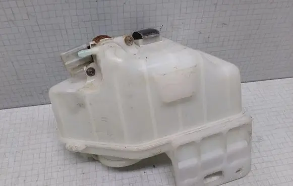 Mazda 323 F Windshield washer fluid reservoir/tank