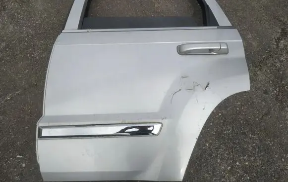 Jeep Grand Cherokee (WK) Rear door pilkos