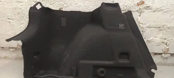 Trunk/boot lower side trim panel