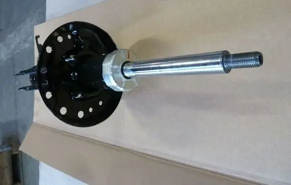 Opel Astra J Front shock absorber/damper 13412613