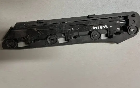 Volkswagen Touran I Front bumper mounting bracket 1T0807050