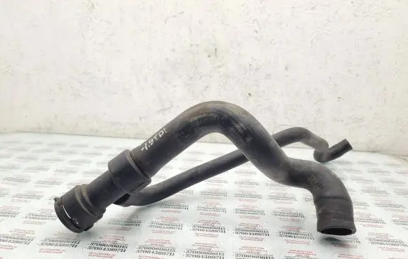 Volkswagen PASSAT B5 Engine coolant pipe/hose 8D0121055F