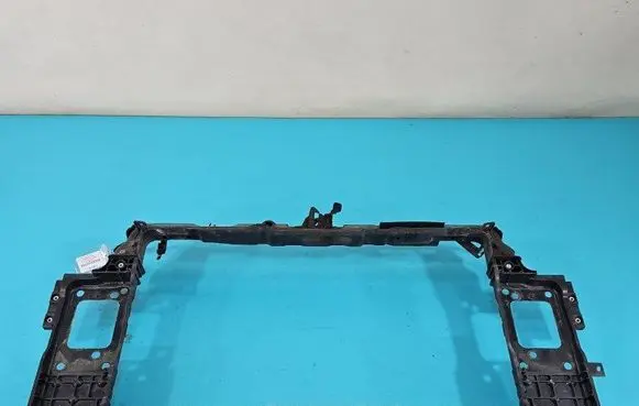 Radiator support slam panel