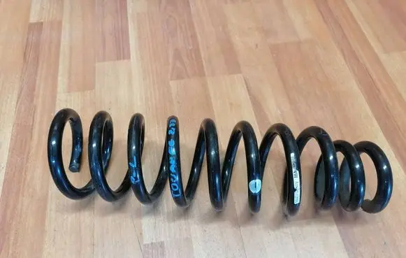 Volkswagen Touareg I Front coil spring 7L6411105K