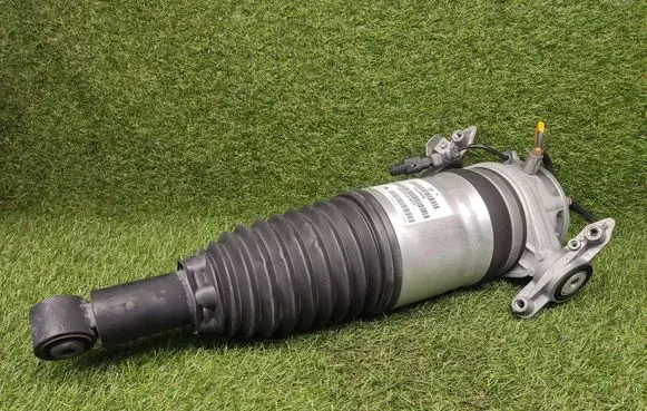 Volkswagen Touareg II Shock absorber/damper/air suspension 7P6616020K 7P6616504H