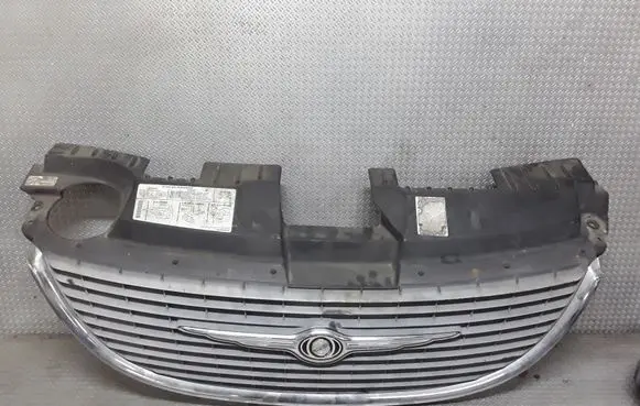 Chrysler Voyager Front bumper upper radiator grill 4857522AA