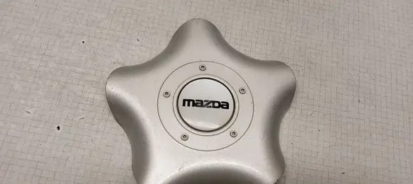 Mazda 323 F Original wheel cap ZD03