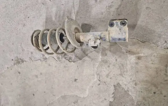 Front shock absorber with coil spring