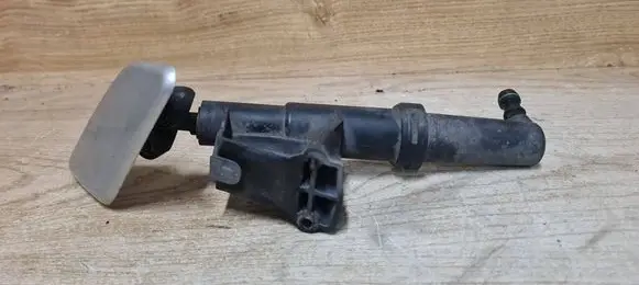 Headlight washer spray nozzle