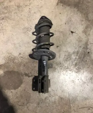 Front shock absorber with coil spring