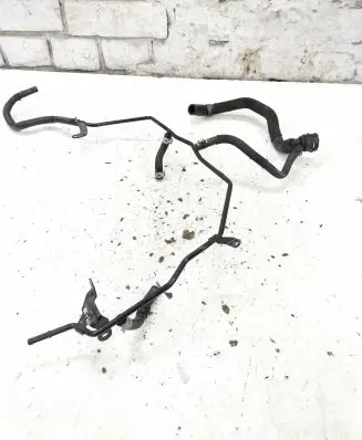 Volkswagen PASSAT B8 Engine coolant pipe/hose 5Q0121447G