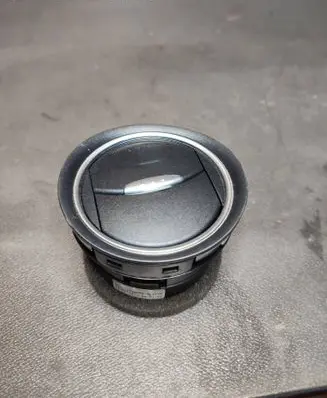 Dash center air vent grill