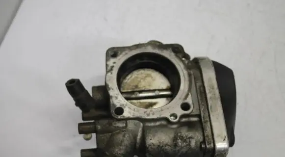 Volkswagen Touran I Throttle valve 06A133062AT 073041 A2C53093430