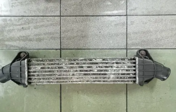 Ford Mondeo Mk III Intercooler radiator 1S7Q9L440