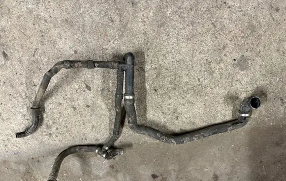 Volkswagen Golf VII Engine coolant pipe/hose 5Q0122051BJ