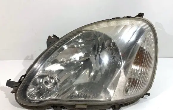 Toyota Yaris Headlight/headlamp 89007614