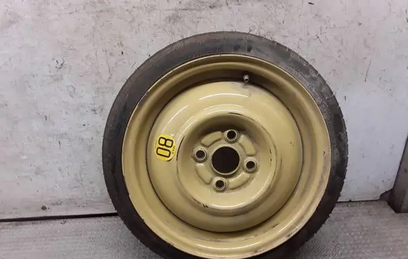Daihatsu Cuore R14 spare wheel