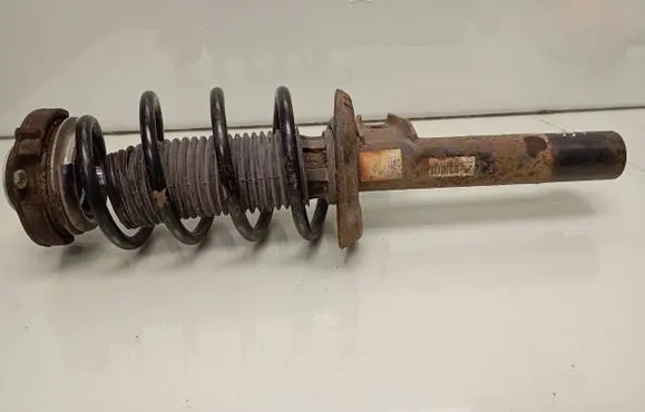 Volkswagen Golf VI Front shock absorber with coil spring 1K0411331BG 1kd412331a