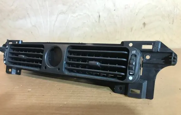 Dash center air vent grill