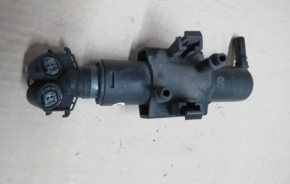 Ford Kuga II Headlight washer spray nozzle CV2413L014BA