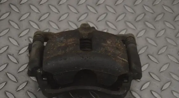Volkswagen Golf VII Front brake caliper