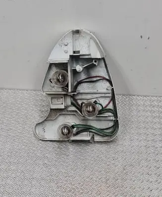 Nissan Sunny Tail light bulb cover holder 22063324