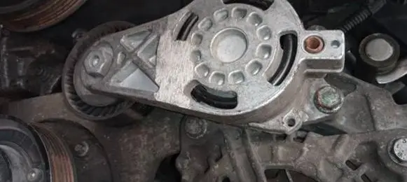 Generator/alternator belt tensioner
