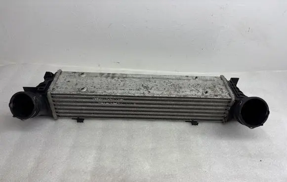 BMW X1 E84 Intercooler radiator 7798788 3296399