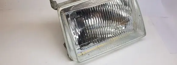 Ford Escort Headlight/headlamp 302124100 24573R20