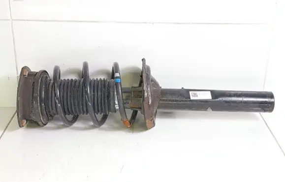 Volkswagen Golf VII Front shock absorber with coil spring 5Q0413023FK 5Q0413023