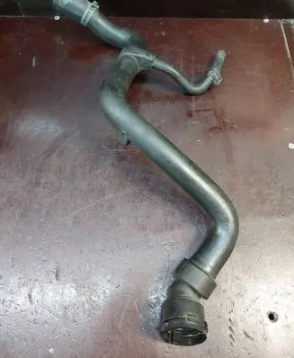 Volkswagen PASSAT B5 Engine coolant pipe/hose 8D0121101J