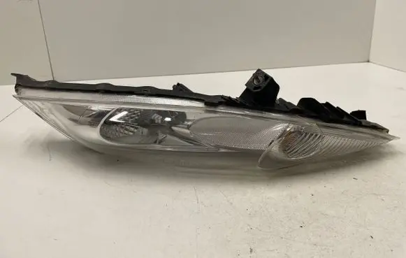 Nissan Juke I F15 Headlight/headlamp