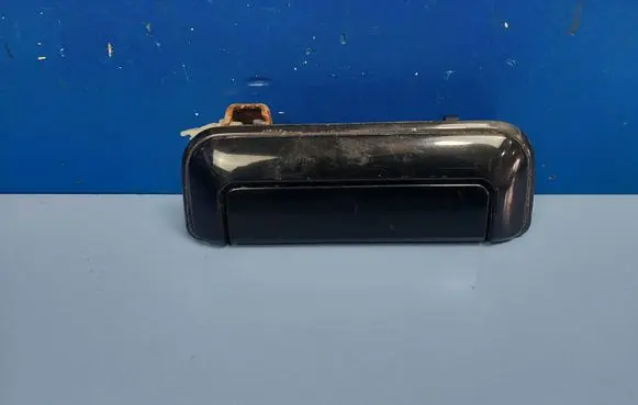 Mitsubishi Pajero Sport I Front door exterior handle MR313840 MR313807