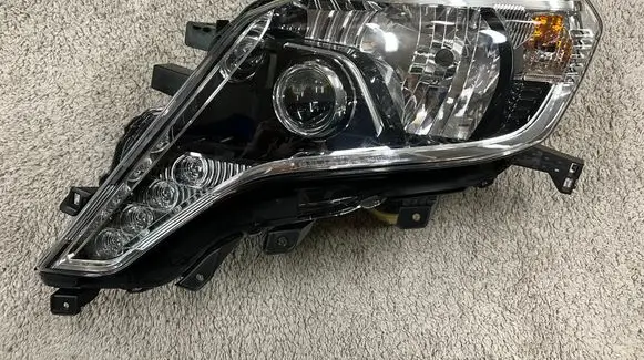 Toyota Land Cruiser (J150) Headlight/headlamp 8114560J20